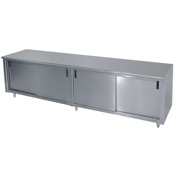 A stainless steel cabinet with a mid shelf and cabinet base.