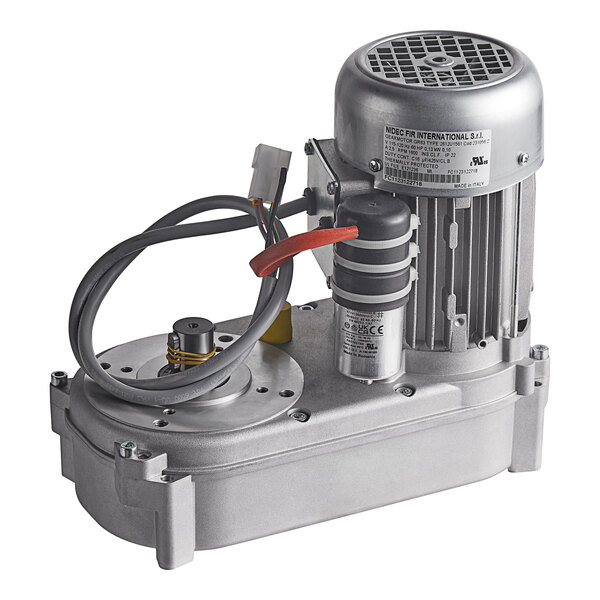 A Manitowoc Ice Mtr Gear Assembly. A small silver electric motor with wires.