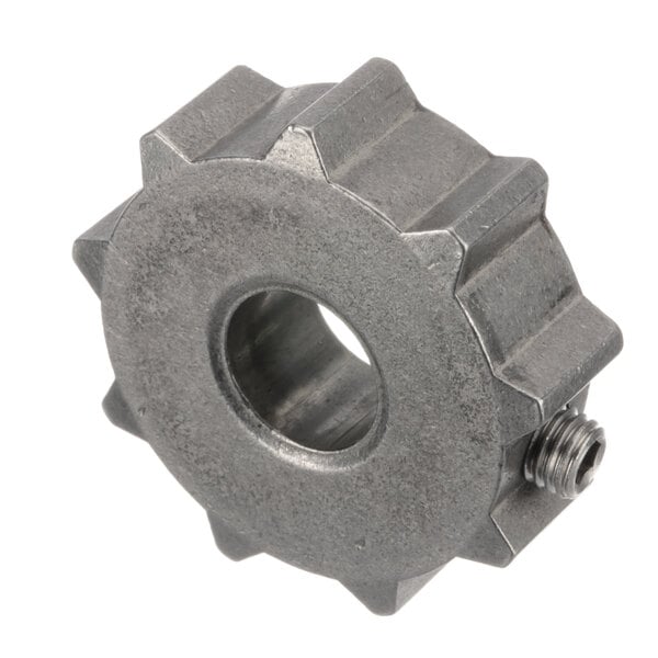 A close-up of a metal drive sprocket with an open end.