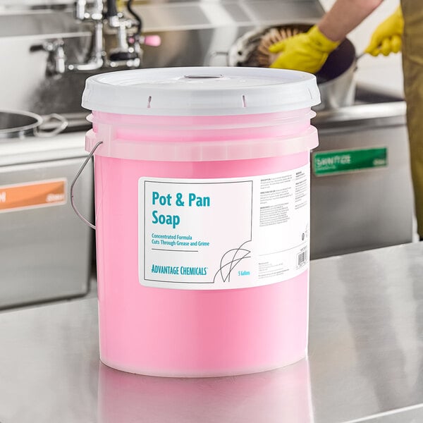 A 5-gallon bucket of Advantage Chemicals concentrated pot and pan soap.