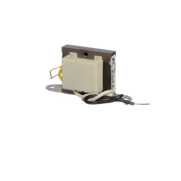 A close-up of a True Refrigeration transformer, a small white square electronic device with wires.