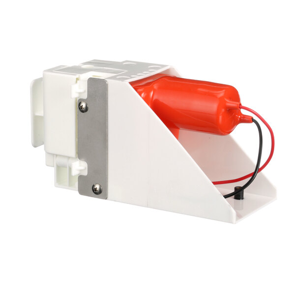 A white and red Cornelius pump assembly with a red wire.