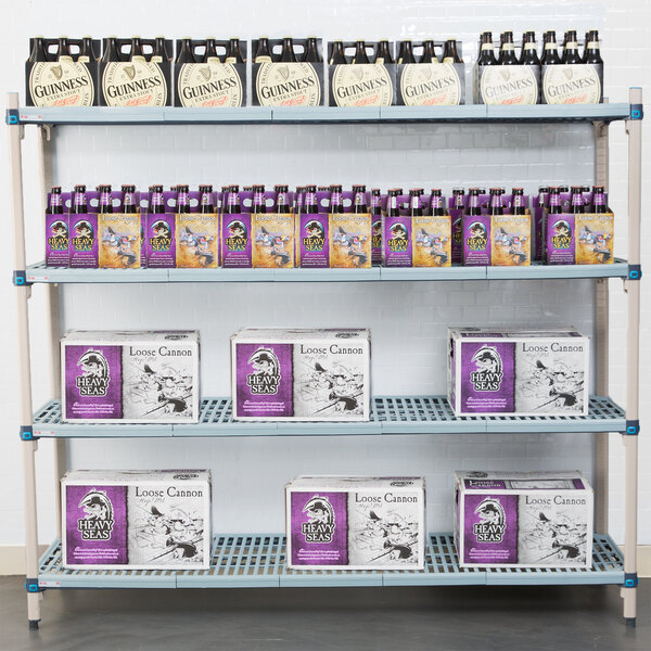 A MetroMax Q shelf with boxes and bottles of beer on it.