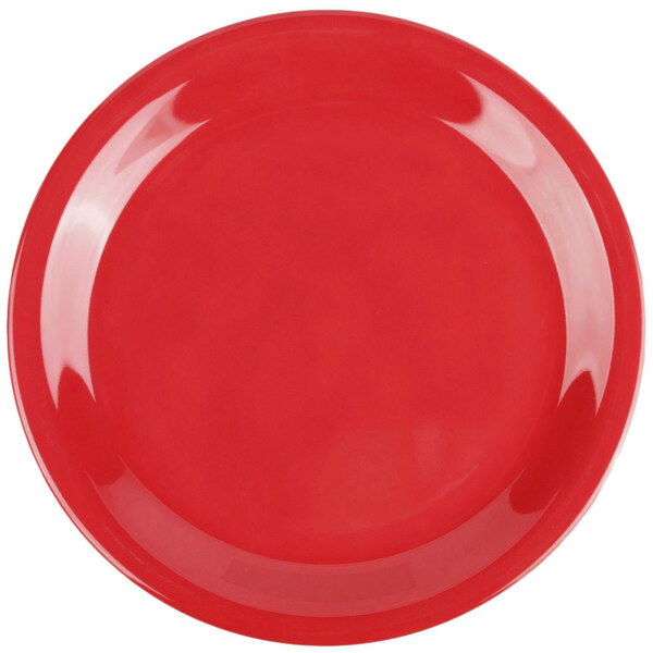 A close-up of a cranberry GET rolled edge plate with a white background.