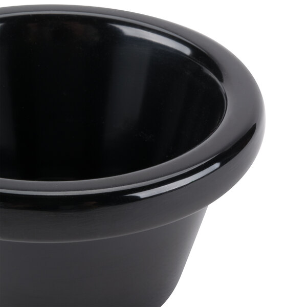 A black Tablecraft melamine ramekin.