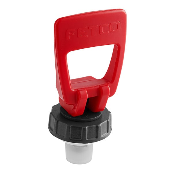 A red plastic bottle cap with a red handle.