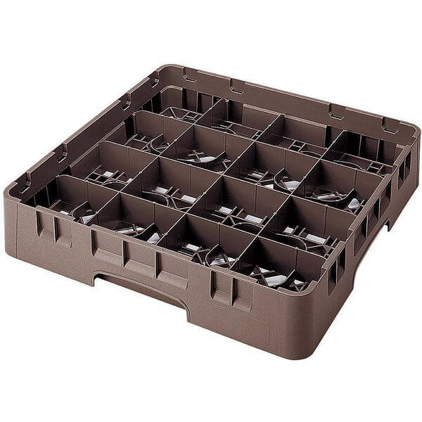 A brown plastic Cambro glass rack with 16 compartments.