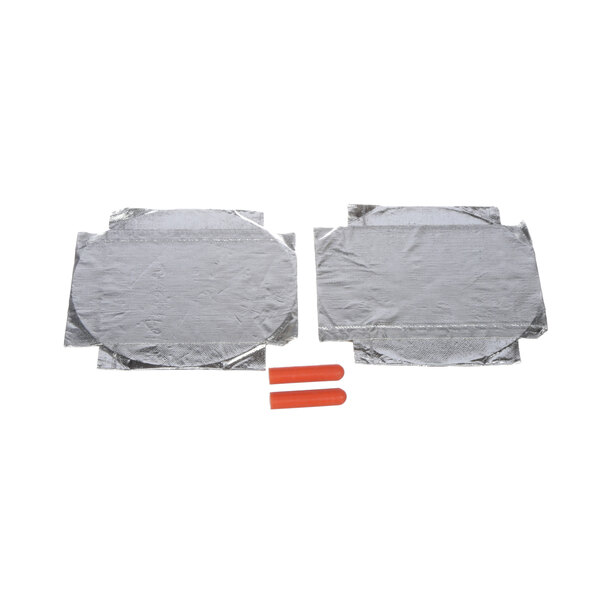 Two silver TurboChef aluminum plates with orange plastic.