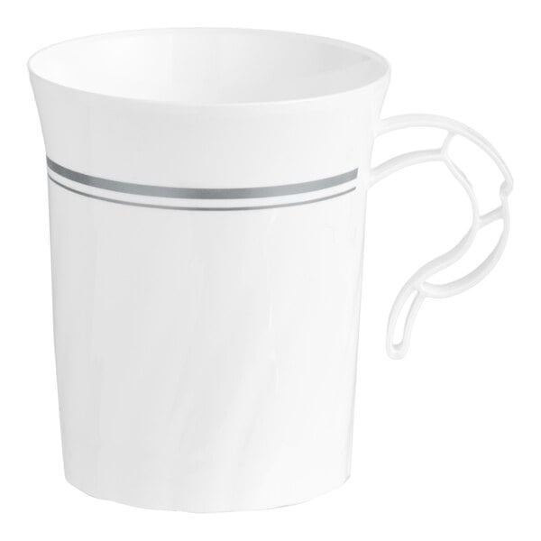A white plastic coffee cup with silver accents and a decorative handle.