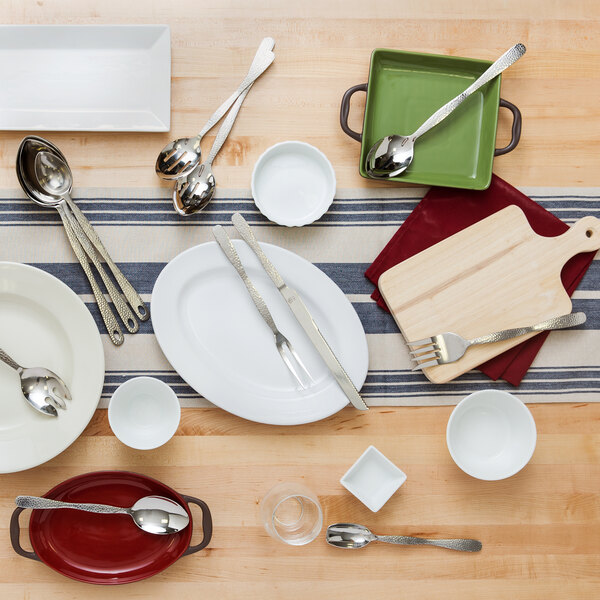 A white Libbey Coos Bay stoneware oval baker on a wood surface.