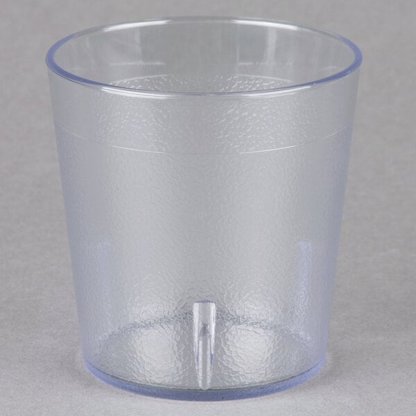 A case of 24 clear Cambro plastic tumblers with a small hole in the bottom.
