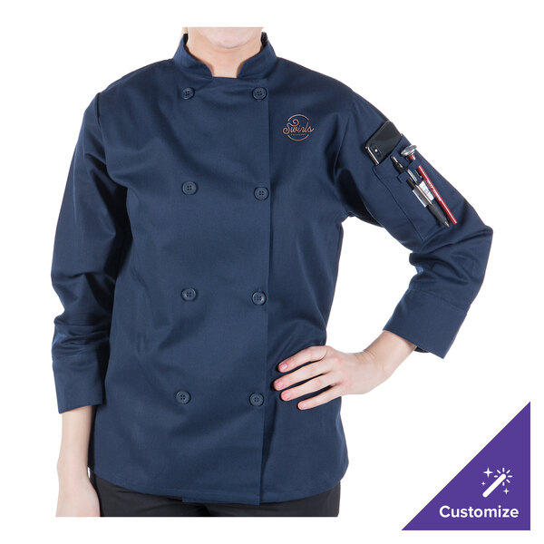 A woman wearing a Mercer Culinary Millennia chef's coat.