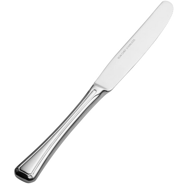 A silver knife with a hollow handle.