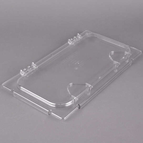A clear plastic food pan lid with 2 notches.