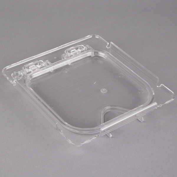 A clear plastic Carlisle food pan lid with a notch.