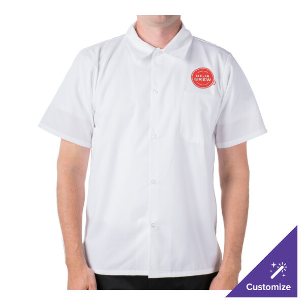 A man wearing a Mercer Culinary Millennia white cook shirt with a red logo.