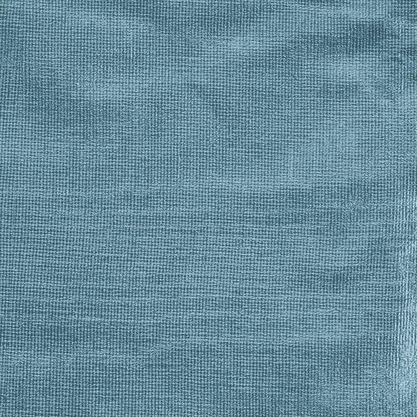 A close up of a blue Intedge vinyl table cover with flannel back.