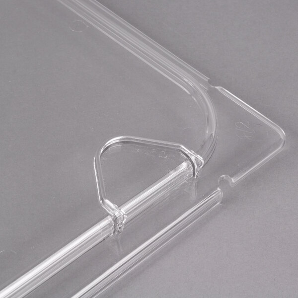A clear plastic Carlisle food pan lid with 2 handles.