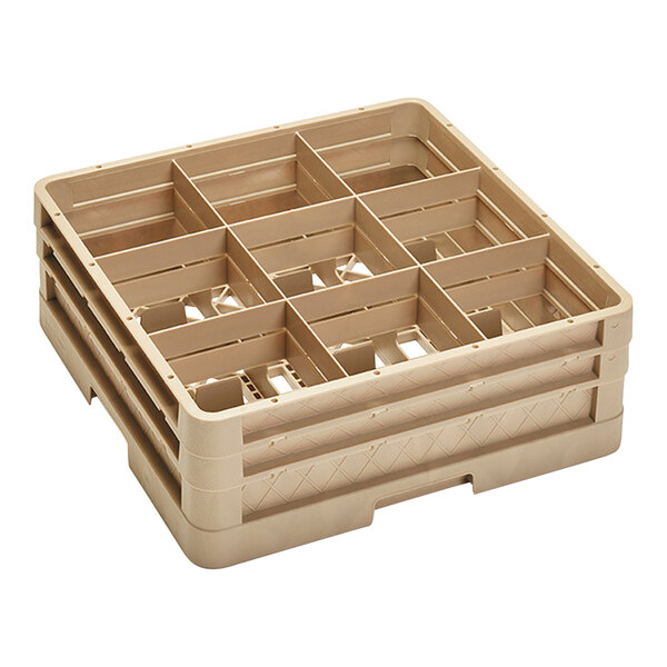 A beige plastic Vollrath glass rack with six compartments with holes.
