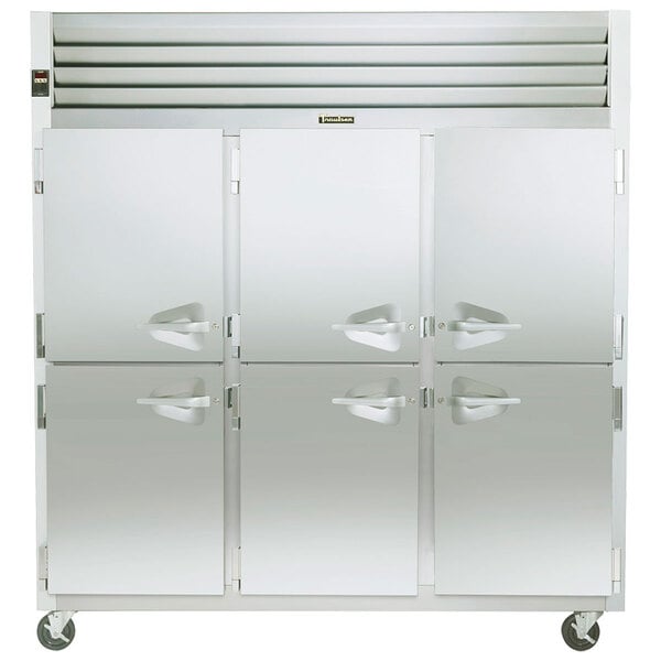 A stainless steel Traulsen reach-in freezer with three half doors.