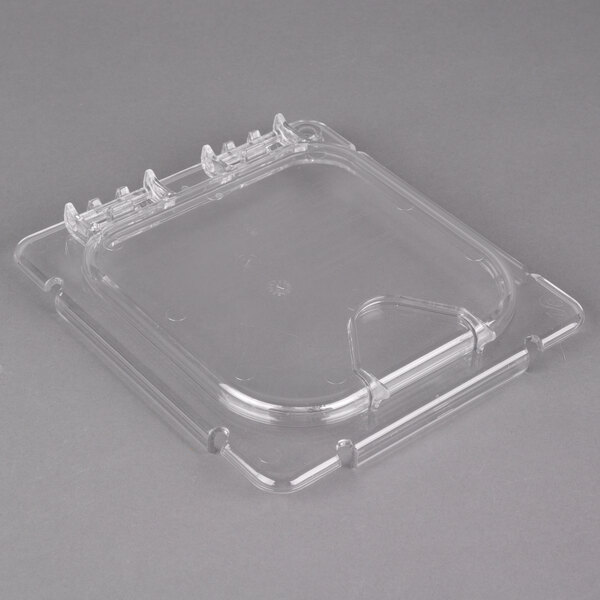 A Carlisle clear plastic food pan lid with a clip.