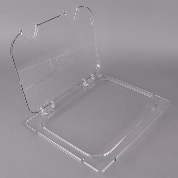 A Carlisle clear plastic food pan lid with 2 notches on a clear plastic container.