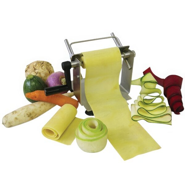 A Bron Coucke stainless steel cutter with sliced vegetables and pasta.