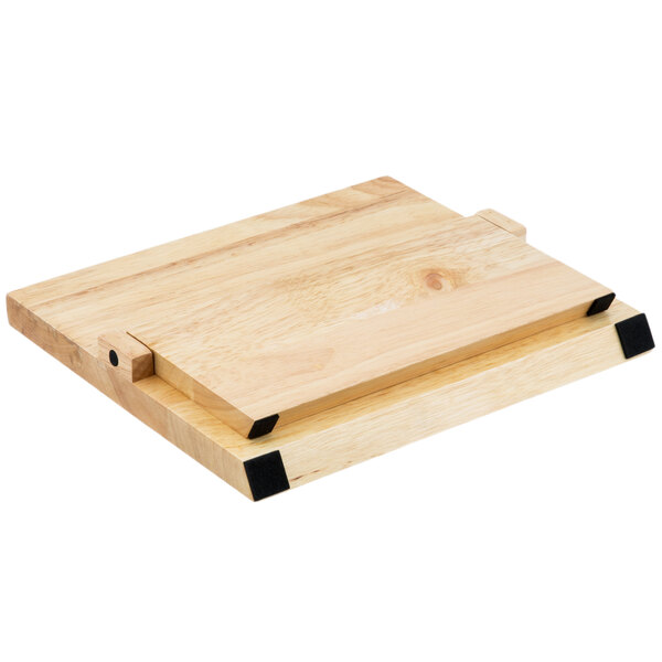 A Mercer Culinary Renaissance wooden magnetic knife board with black corners.