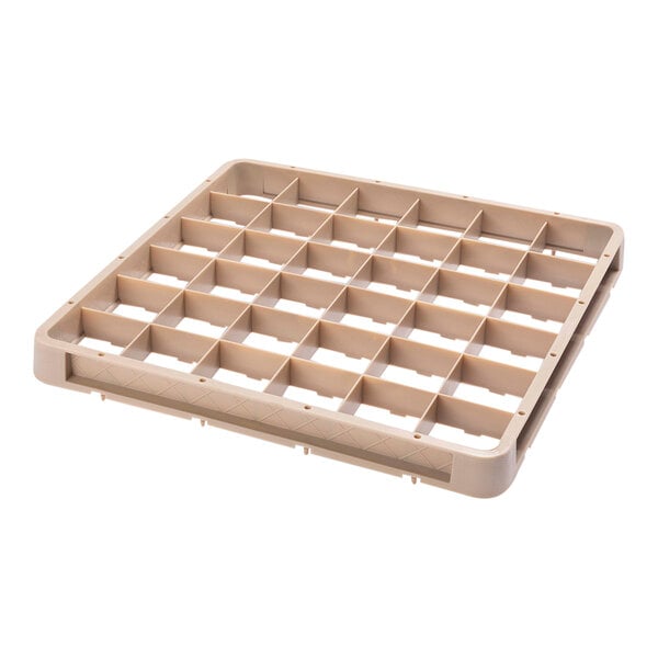 A beige plastic Vollrath Traex extender with many compartments.