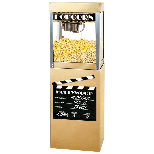 A Benchmark USA Premiere pedestal base for a popcorn machine with a black sign.