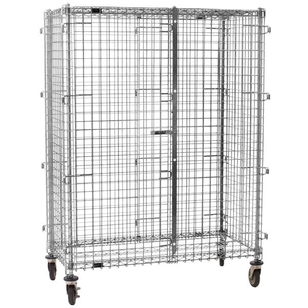 A large metal Eagle Group security cage on wheels.