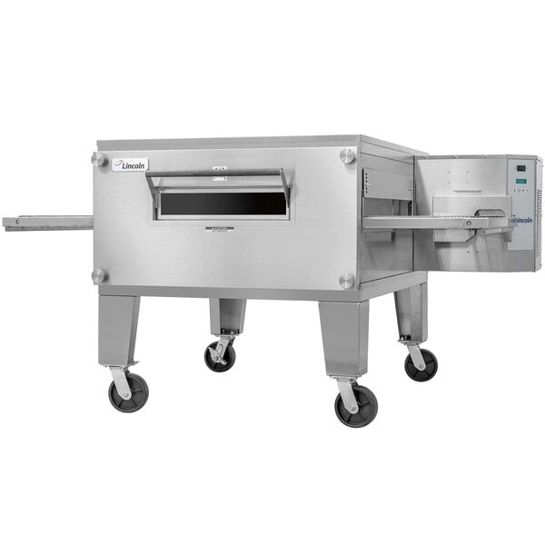 A large stainless steel Lincoln conveyor oven with wheels.
