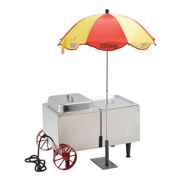 A small stainless steel hot dog cart with red wheels and a red and yellow umbrella labeled 'HOTDOGS.'