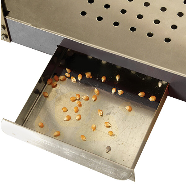 A Benchmark USA Metropolitan popcorn machine with corn seeds in a drawer.