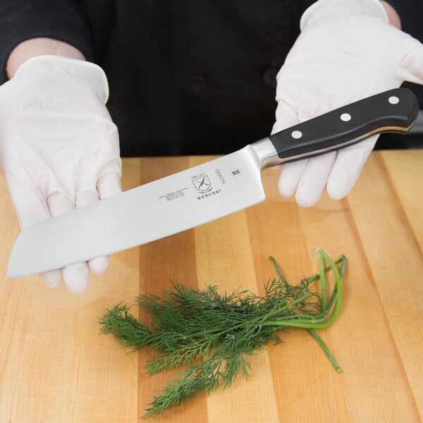 a person holding a knife