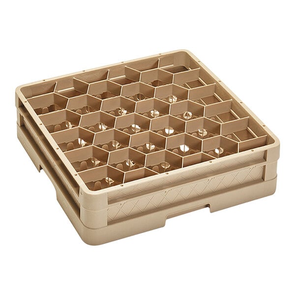 A beige plastic Vollrath Traex rack with honeycomb compartments.