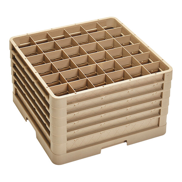 A beige Vollrath Traex glass rack with many compartments.