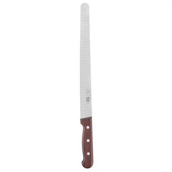 A Victorinox slicing and carving knife with a rosewood handle.