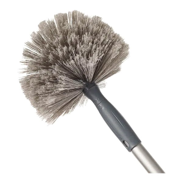 A round cobweb duster brush with gray bristles and a gray handle.