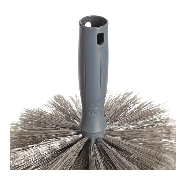 A round gray cobweb duster brush with synthetic bristles and a plastic handle.