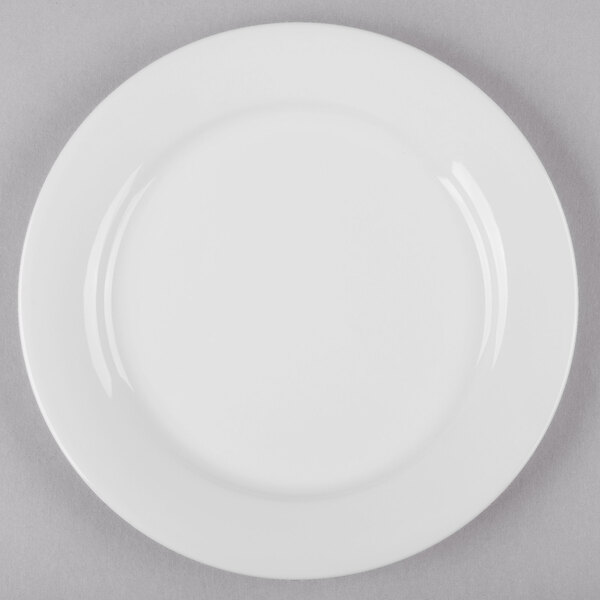 A white bone china side plate with a white rim.