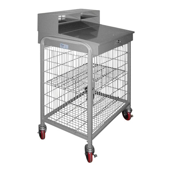 A large grey steel cage on red wheels with a wire mesh top.
