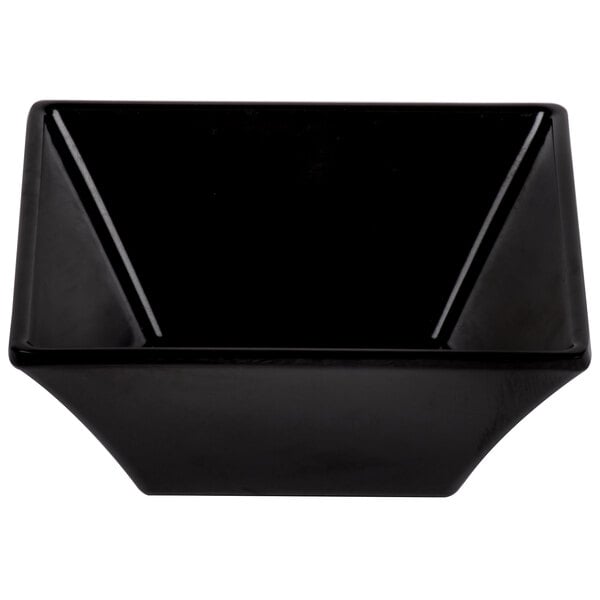 a black bowl with a triangle shape