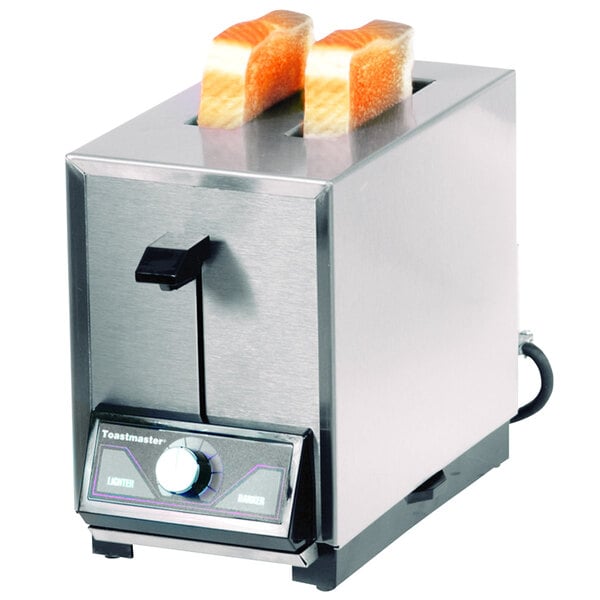 A Toastmaster commercial toaster with two slices of bread popping up.
