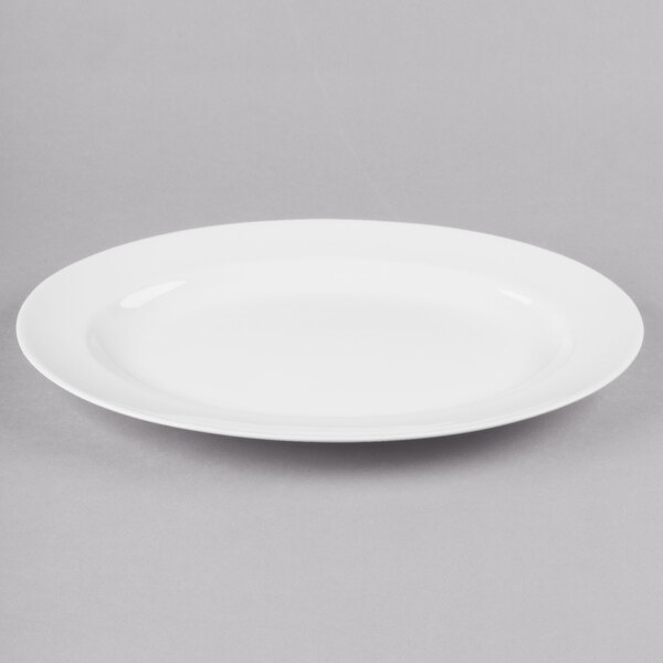 a white plate on a gray background