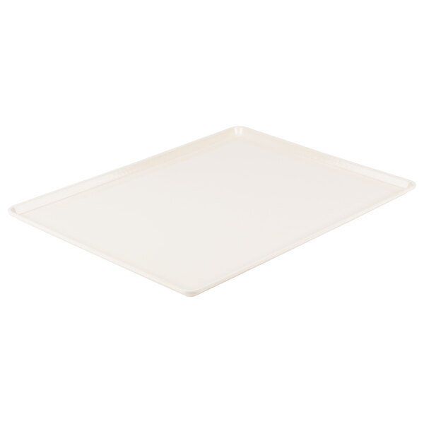 A white rectangular tray with a handle.