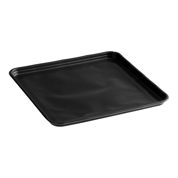 A black square TurboChef solid Teflon basket on a counter.