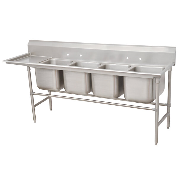 A stainless steel Advance Tabco four compartment pot sink with a left drainboard.