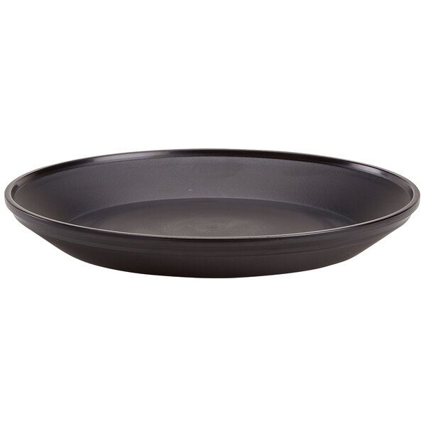 A close up of a black Cambro Camchiller pellet plate.
