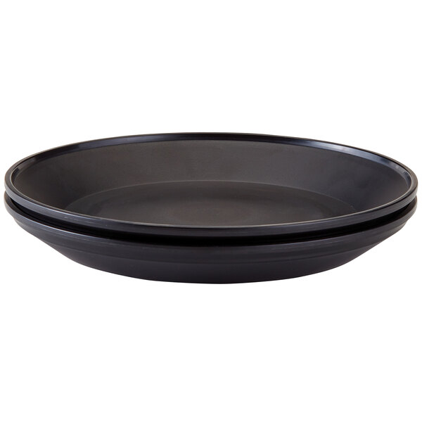 A black Cambro Camchiller with two black handles on a counter.